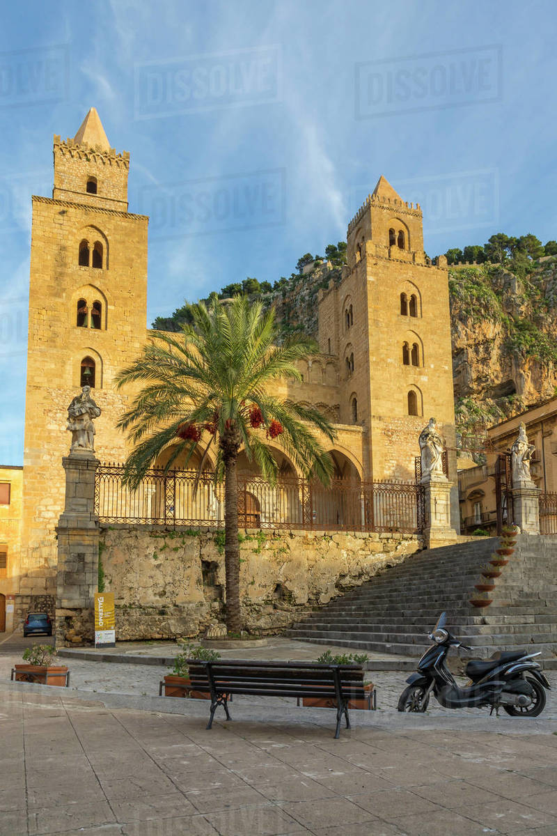 The Cathedral of Cefalu, UNESCO World Heritage Site, with Rocca di Cefalu in the background at sunset, Cefalu, Sicily, Italy, Europe Royalty-free stock photo