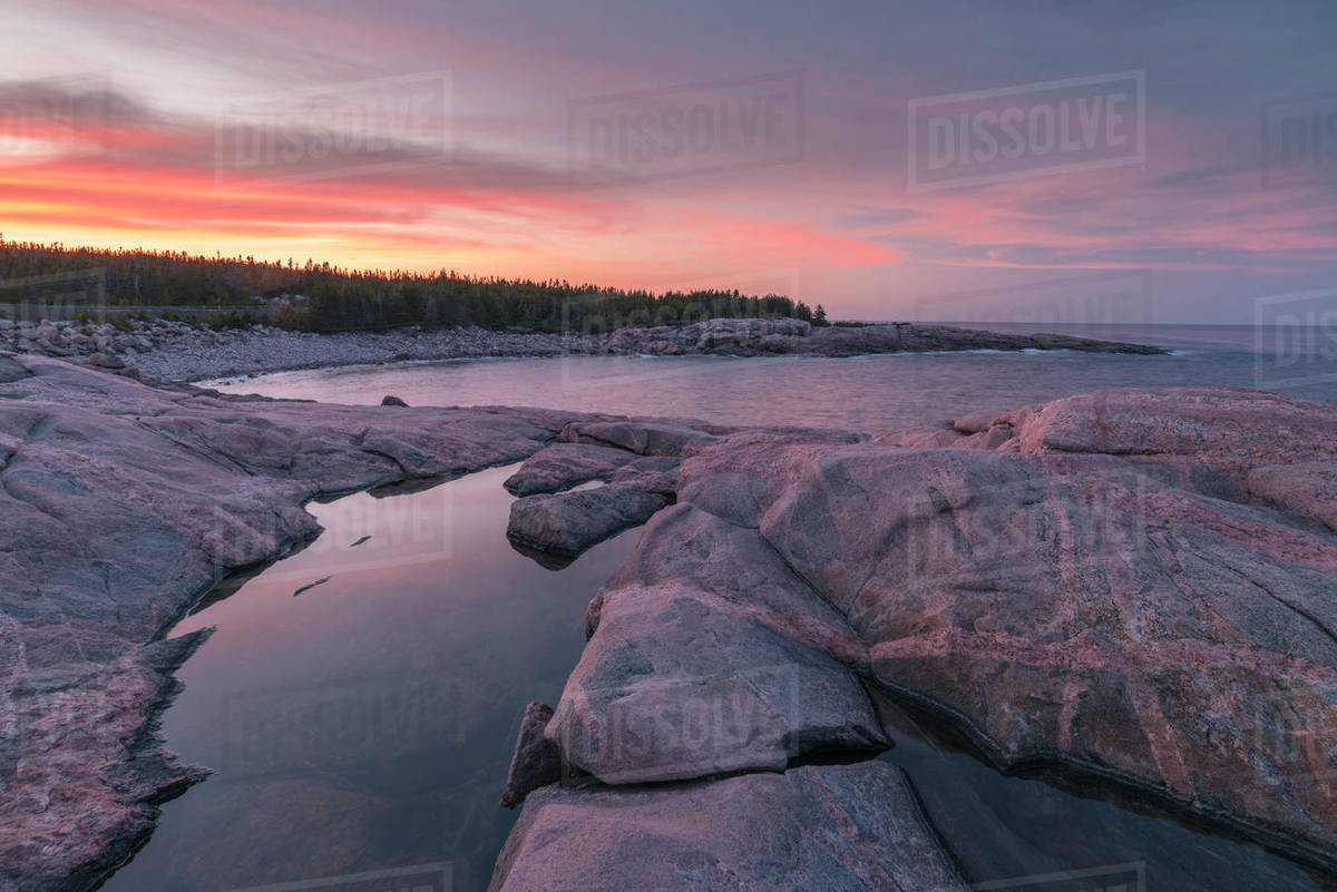 Waves and rocky coastline at sunset, Lackies Head and Green Cove, Cape