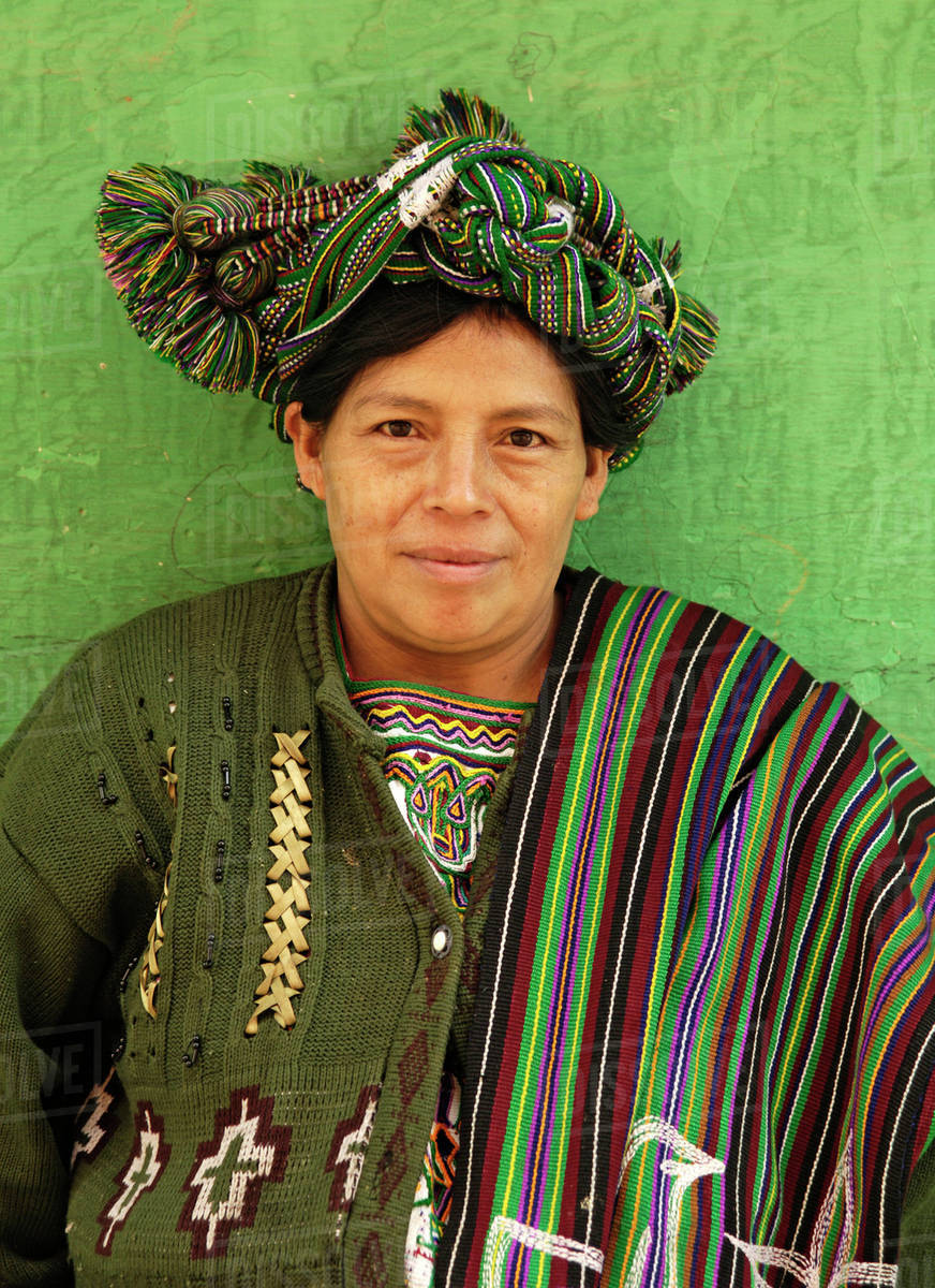 Guatemala, Nebaj, Woman posing in traditional dress. - Royalty-free Stock  Photo | Dissolve