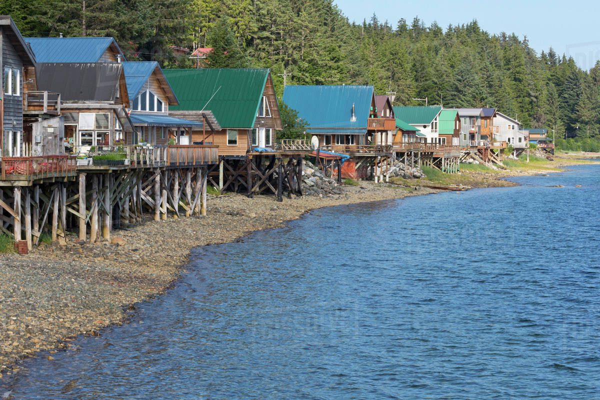 USA, Alaska, Tenakee Springs. Waterfront homes on stilts. Stock Photo