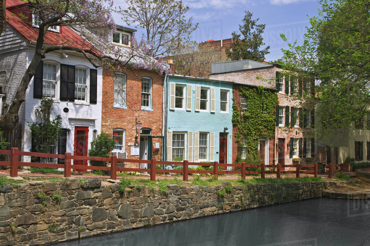 USA, Virginia, Canal next to buildings in Chesapeake and