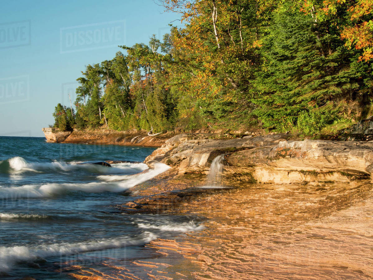 USA, Michigan, Upper Peninsula. Small waterfall along the edge of Lake Superior, Pictured Rocks