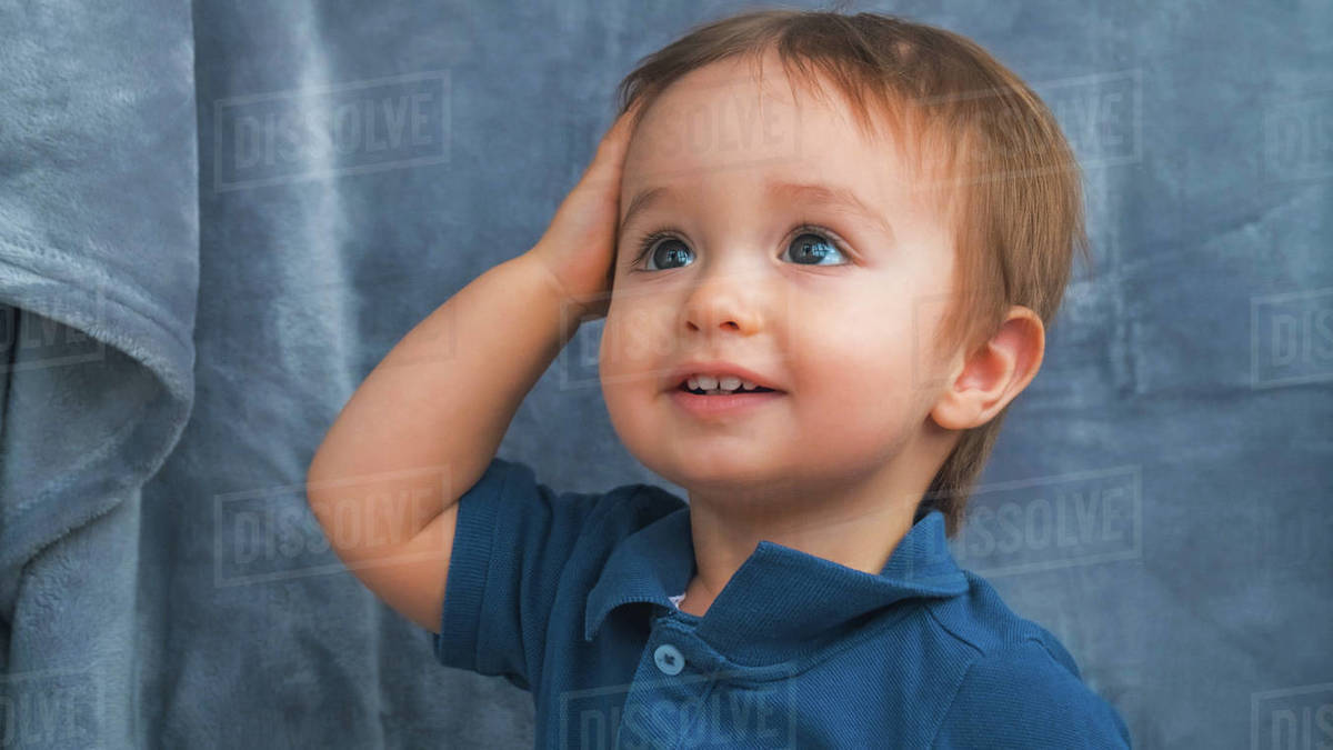 The cute little boy have fun at home Stock Photo Dissolve