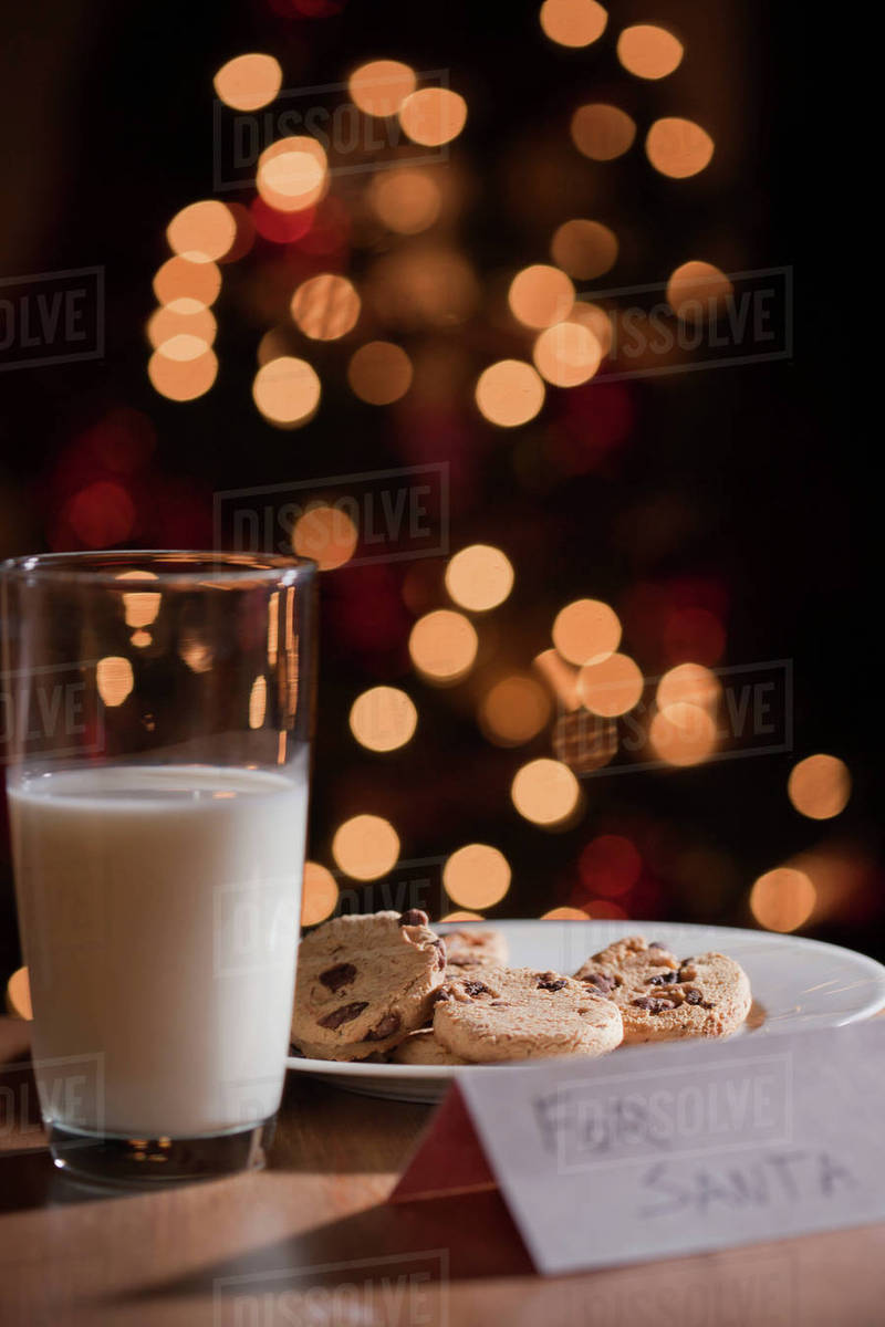 Glass of milk and plate of cookies for santa Royalty-free stock photo