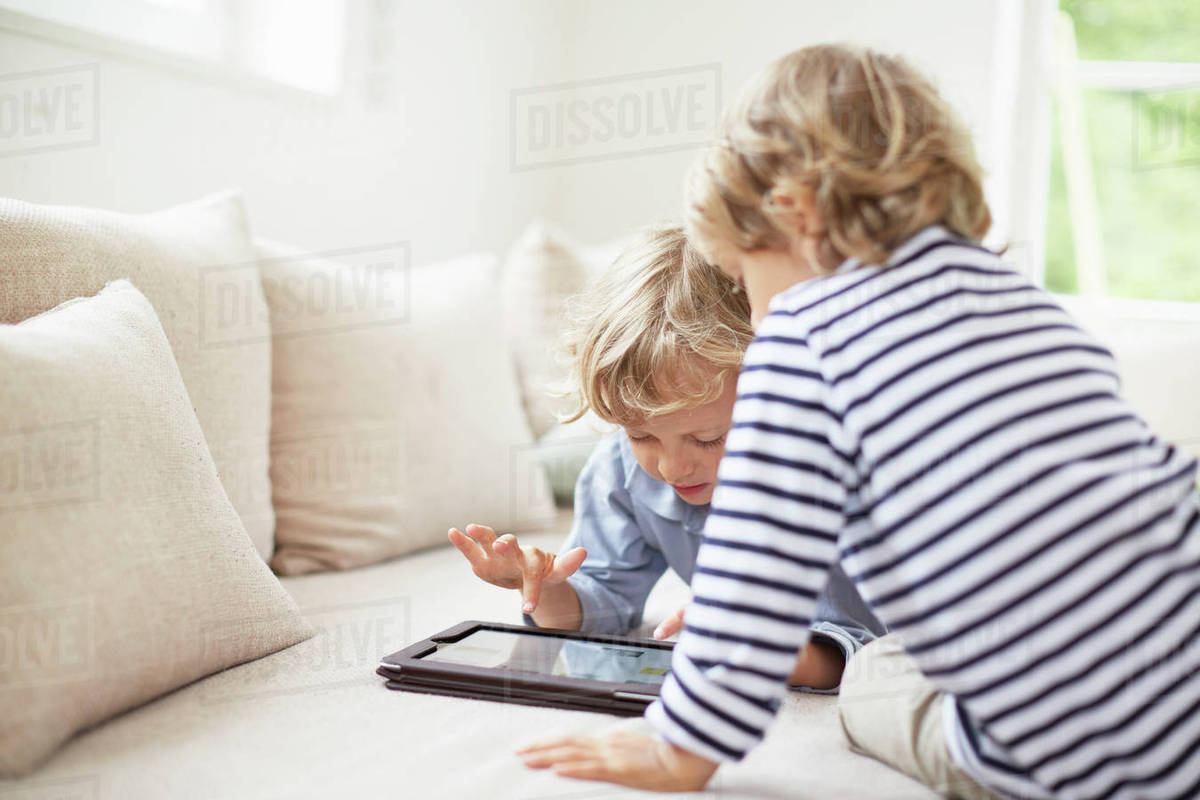 Two boys in sofa