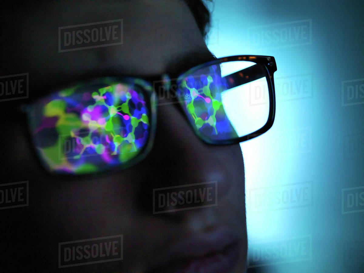Biotechnology research, computer screen reflection in spectacles of new ...