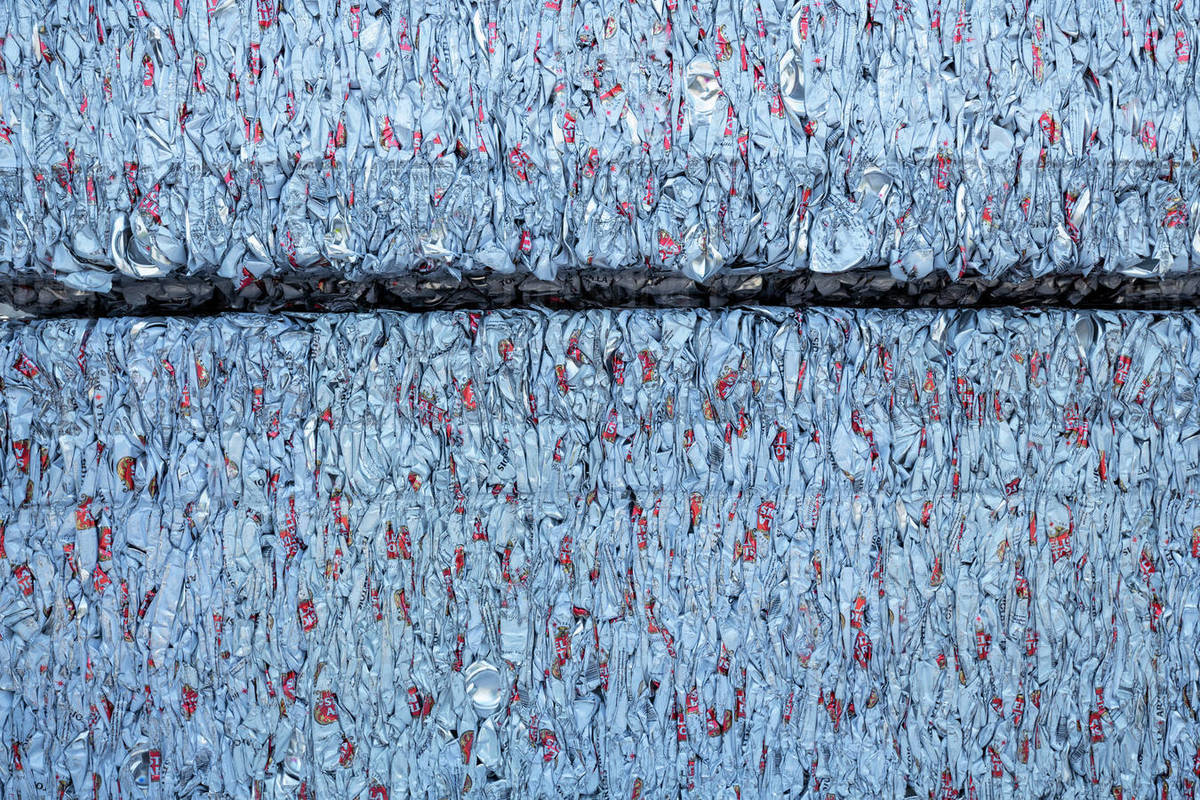 Details of crushed clean cans in aluminum can recycling factory Stock