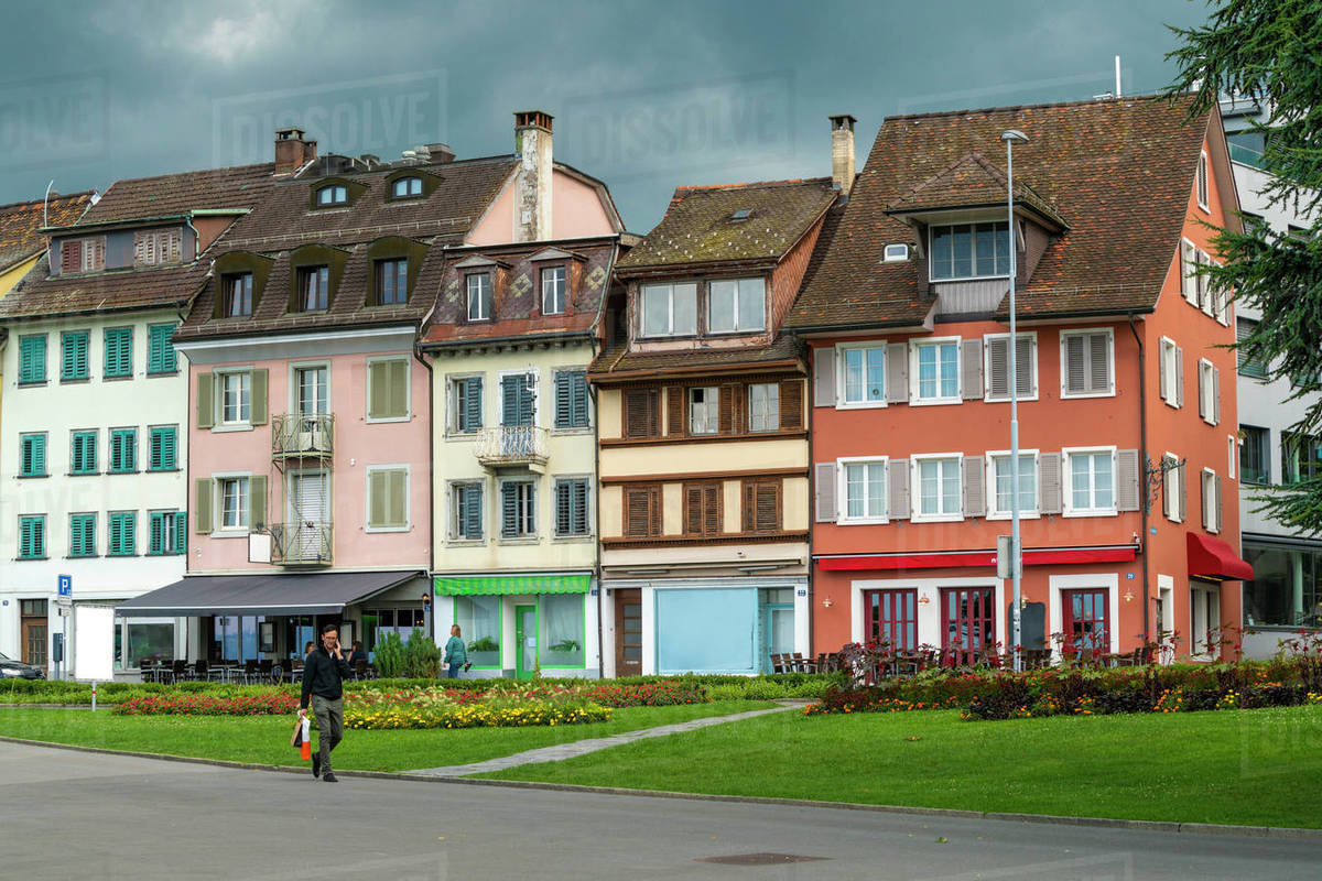 Row of colorful townhouses in Zug, Switzerland Stock Photo Dissolve