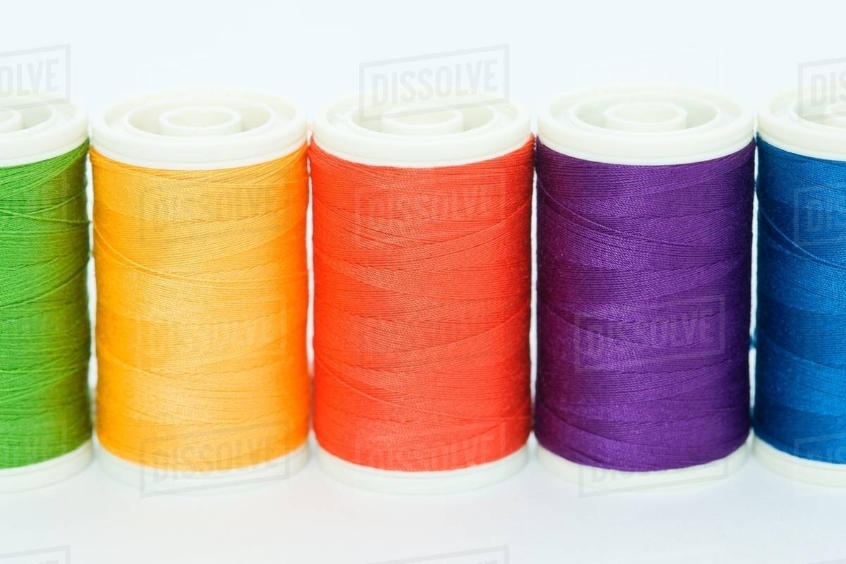 Cotton in a row Stock Photo Dissolve