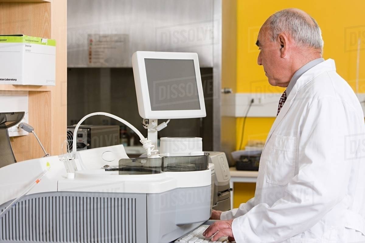 Technician in laboratory Stock Photo Dissolve