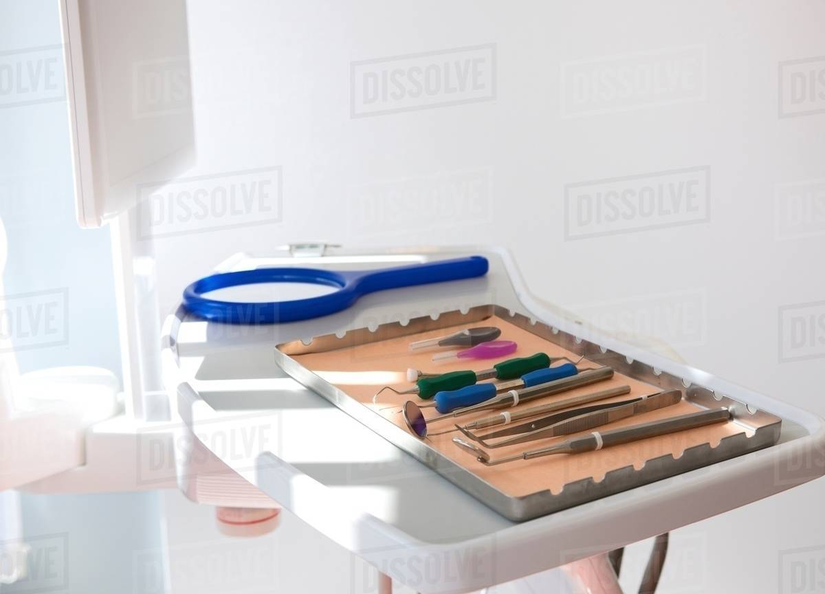 Dental clinic with surgical tray and equipment Stock Photo Dissolve
