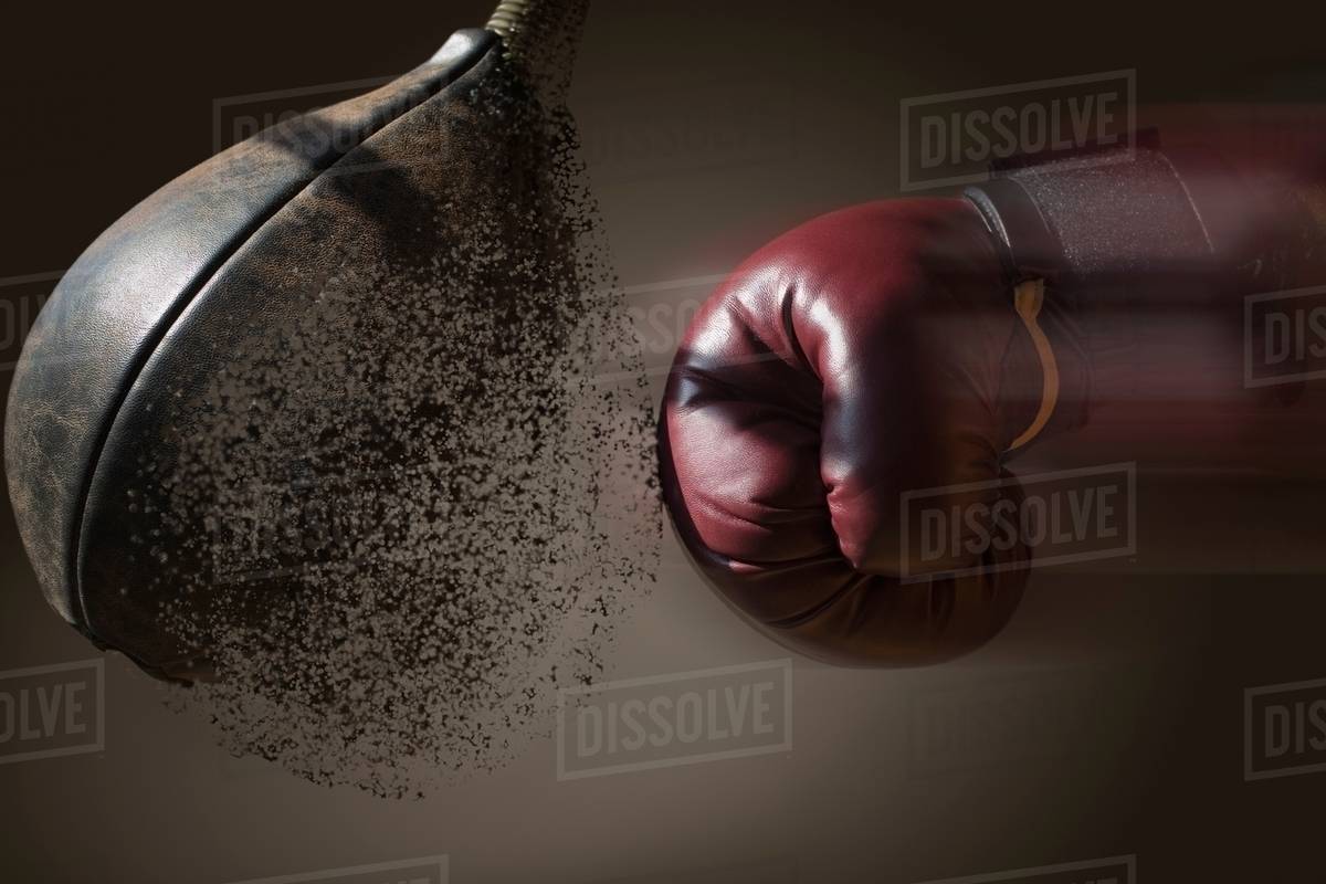 Close Up Boxer And Punch Bag With Blurred Motion Stock Photo