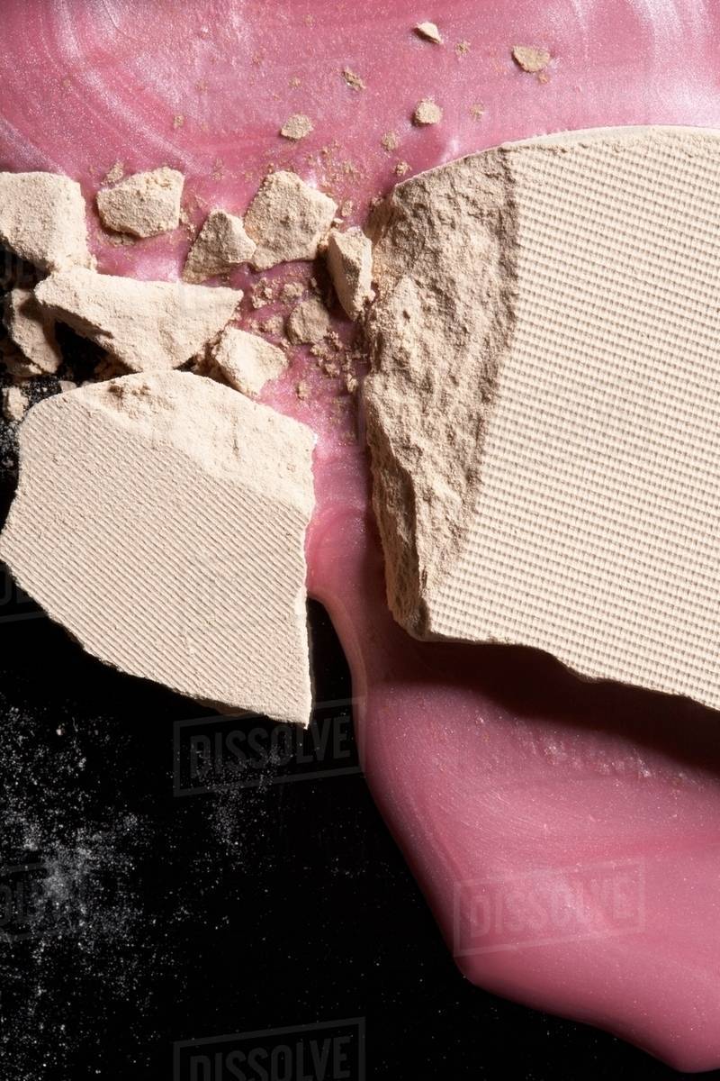 Foundation and nail varnish Stock Photo Dissolve