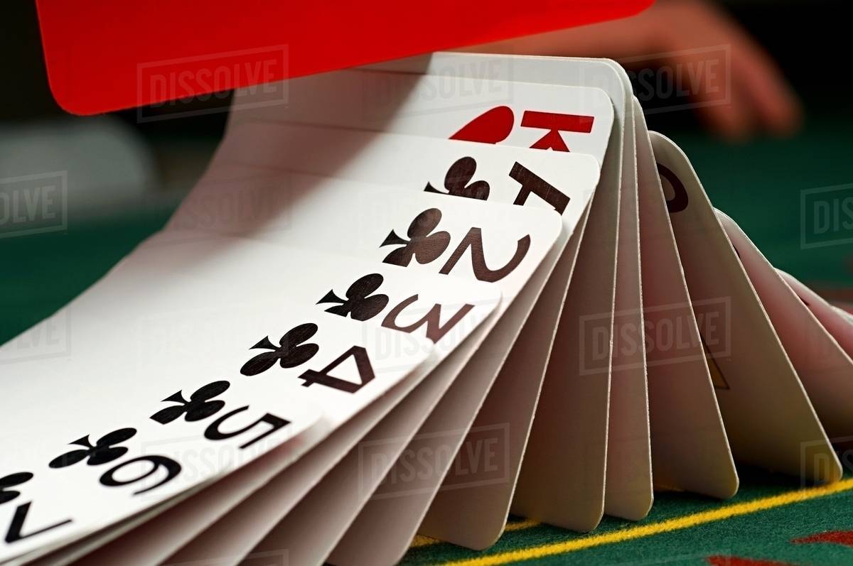 Cards being shuffled Stock Photo Dissolve