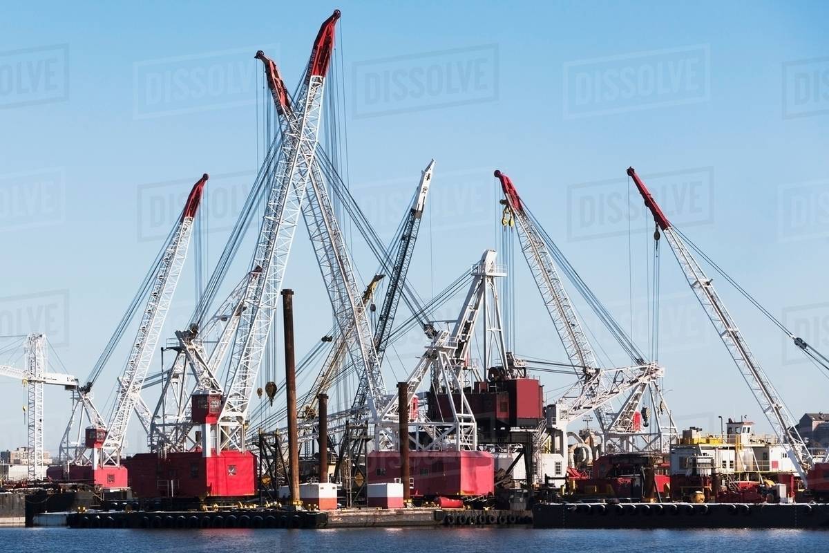 Harbor loading cranes, New York City, USA Stock Photo Dissolve