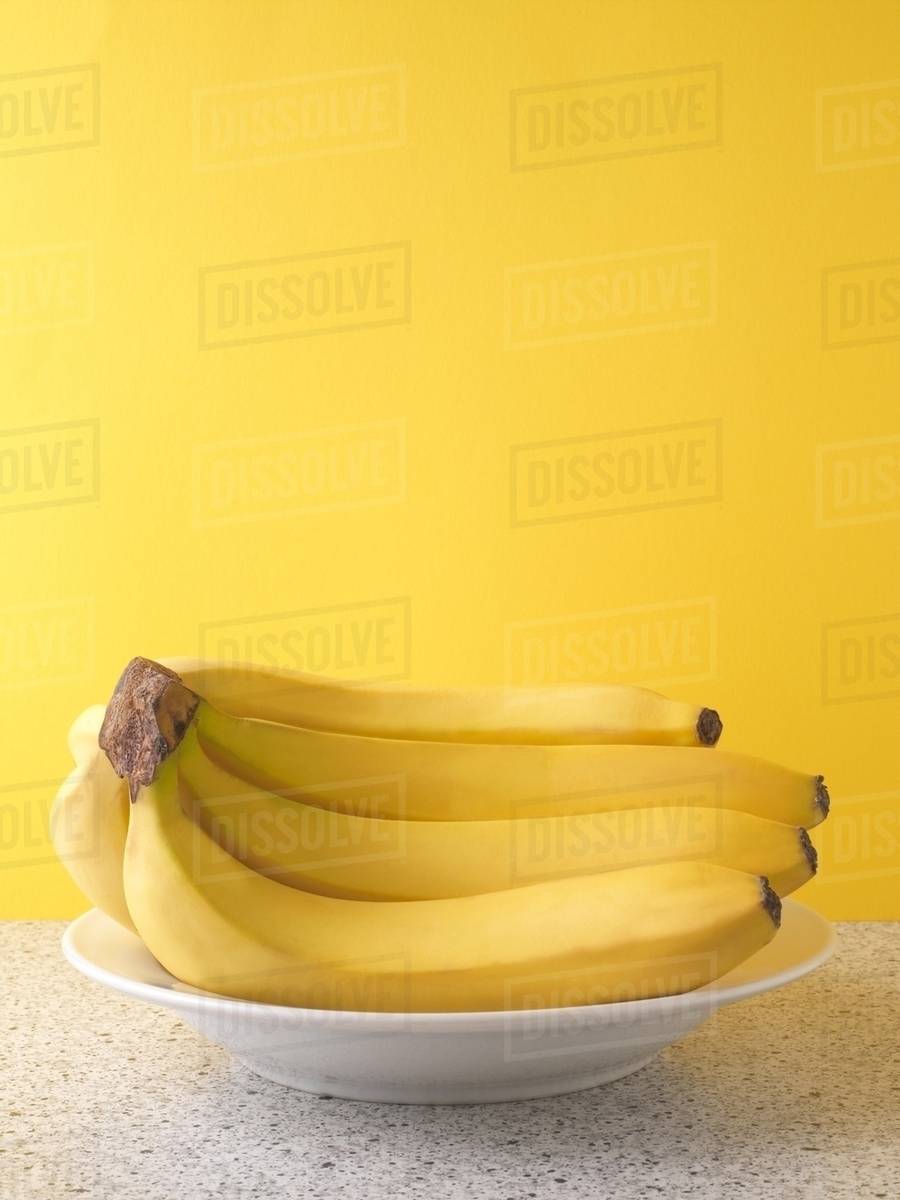 Bananas in a bowl Stock Photo Dissolve