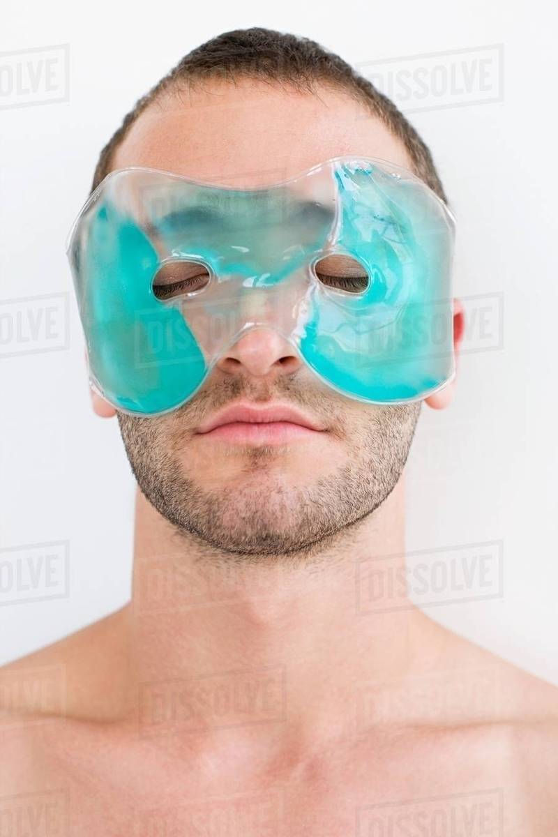 Man wearing gel mask Stock Photo Dissolve