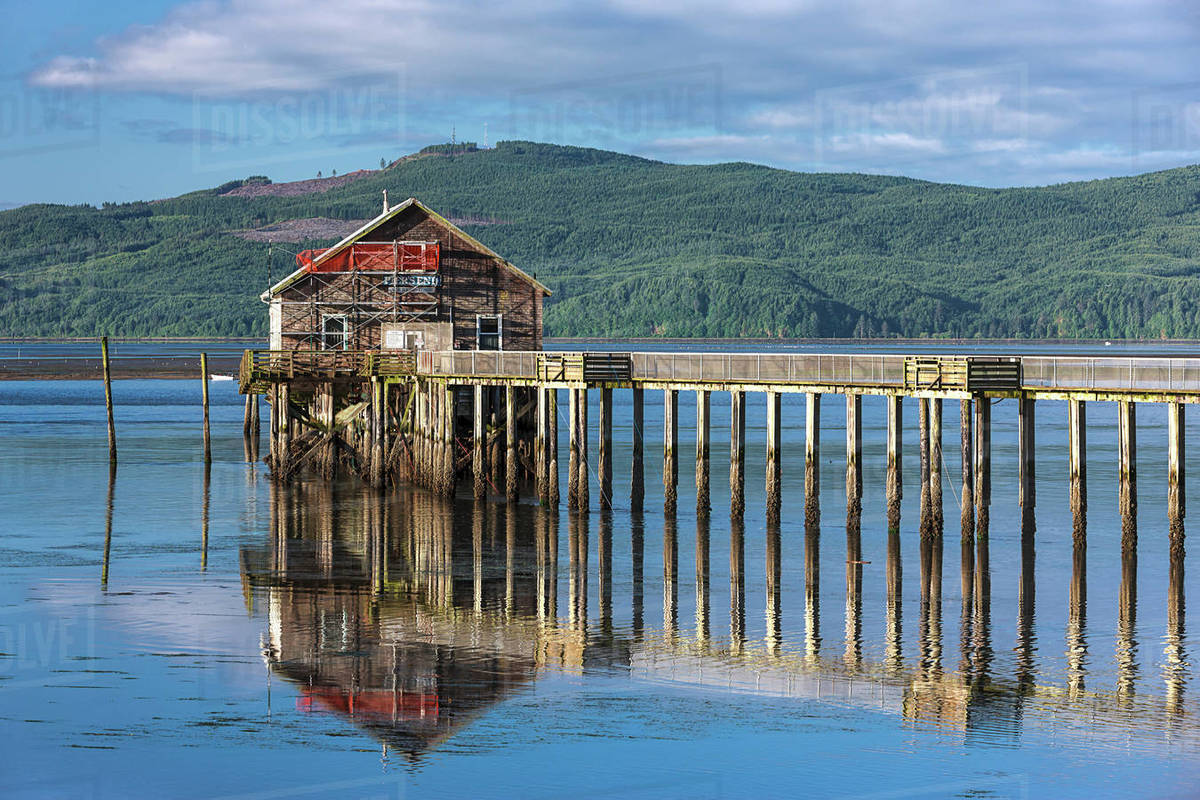 Historic pier and shop on Tillamook Bay in Garibaldi, Oregon. Stock