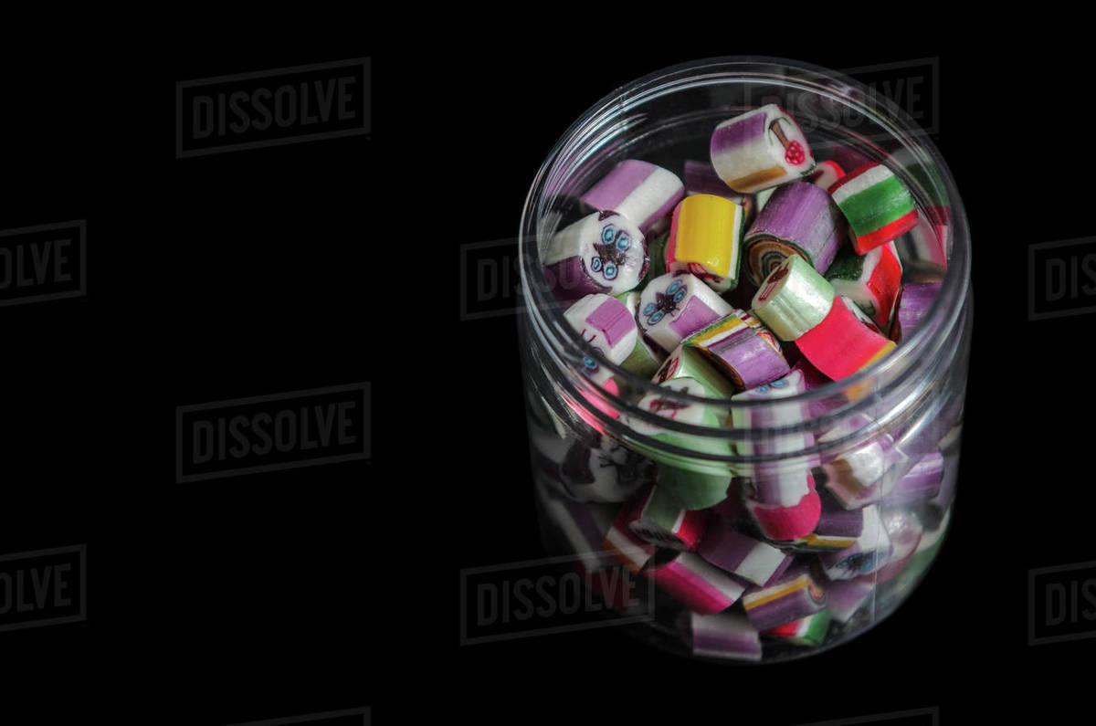 layered caramel color with reflection on dark background Stock Photo