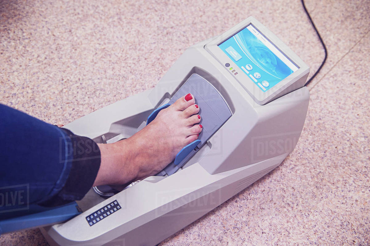 Checking osteoporosis on modern electronic device Stock Photo Dissolve