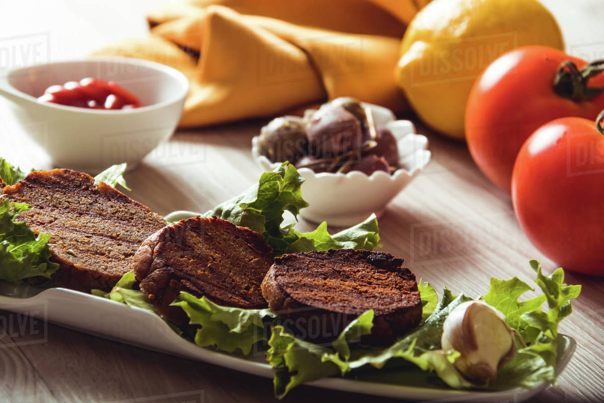 Cooked vegetable seitan dishes Stock Photo Dissolve