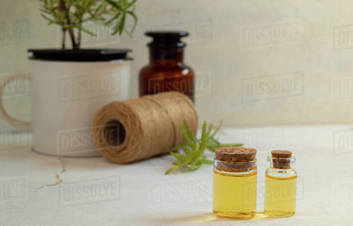 Rosemary essential oil for cooking and skin care Stock Photo Dissolve