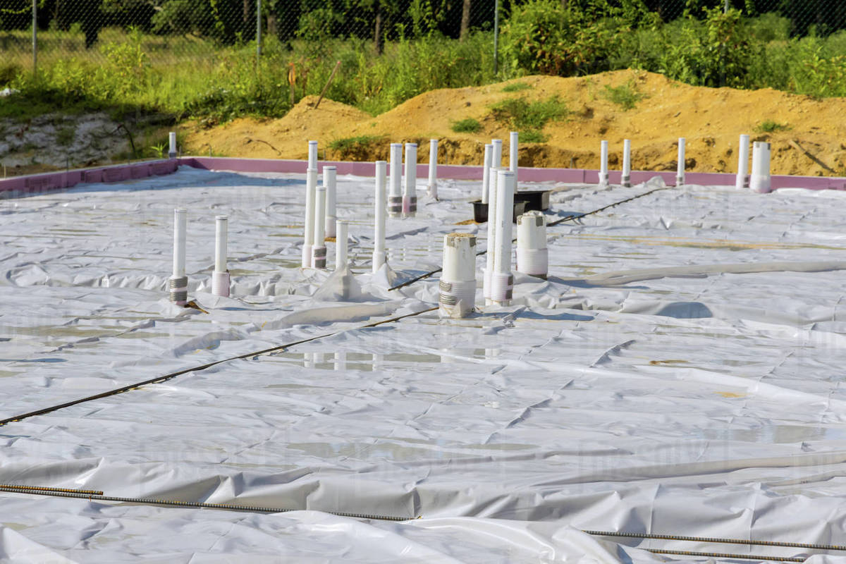PVC drain pipes in a new house in foundation slab preparation for