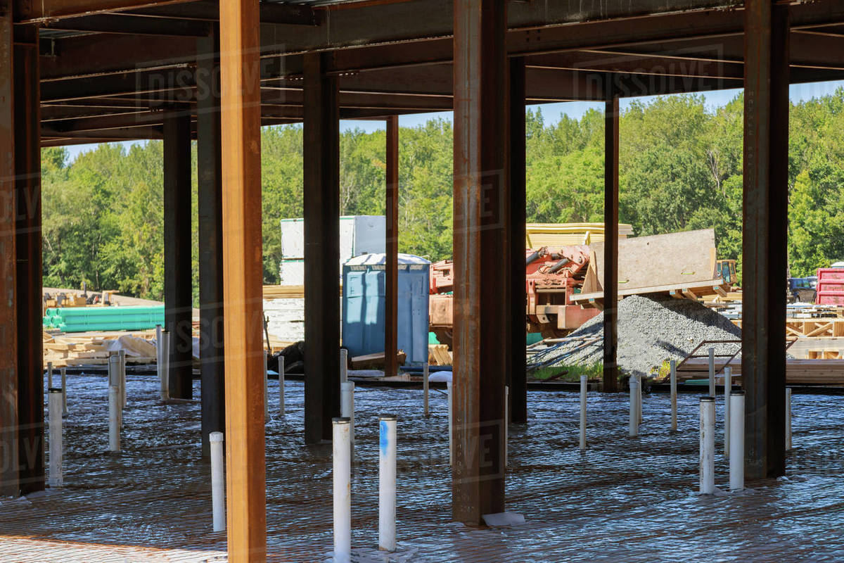 PVC drain pipes in a new house in assembling system of sanitary pipes in the ground Stock