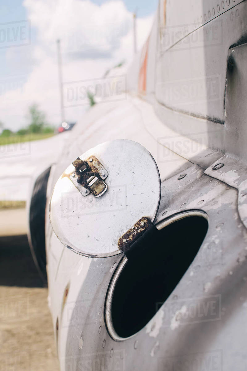 Closeup of part of the fuselage of an old military fighter jet, which
