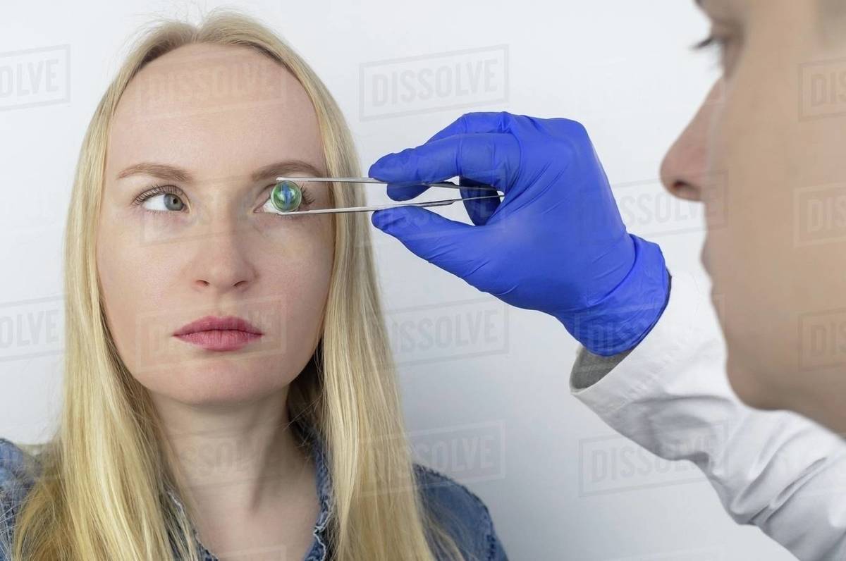 Conceptual shot of an eye crystalline lens replacement. Ophthalmic surgery. Return of sight