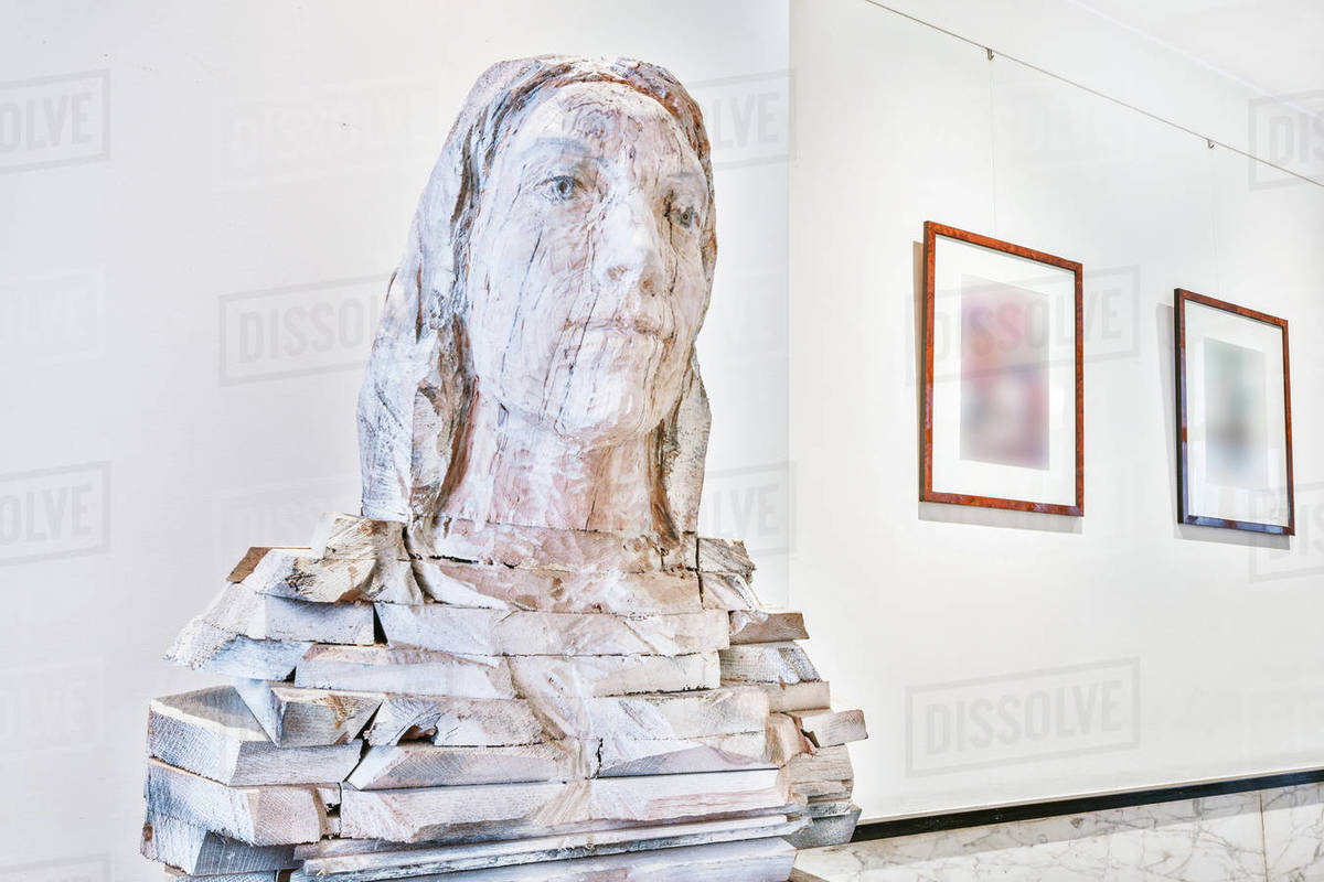 Detail of modern home interior design with stone bust sculpture and