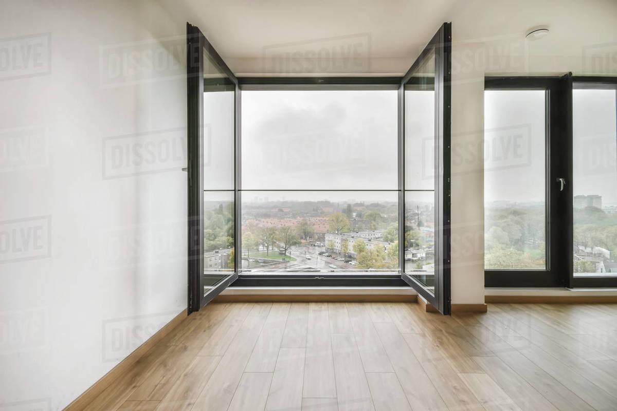 Modern room with wooden floor and white walls Stock Photo Dissolve