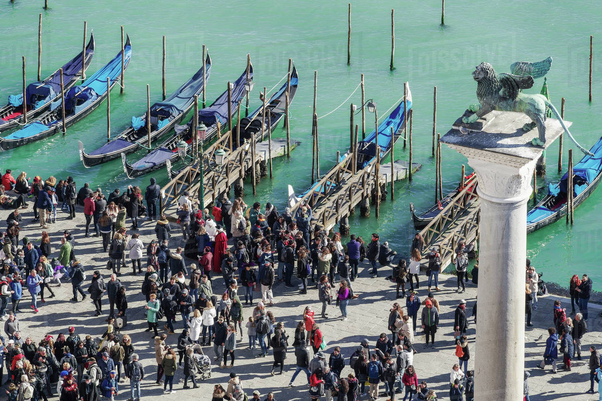 venice-italy-elevated-view-of-crowd-during-carnival-at-gondola-ferry