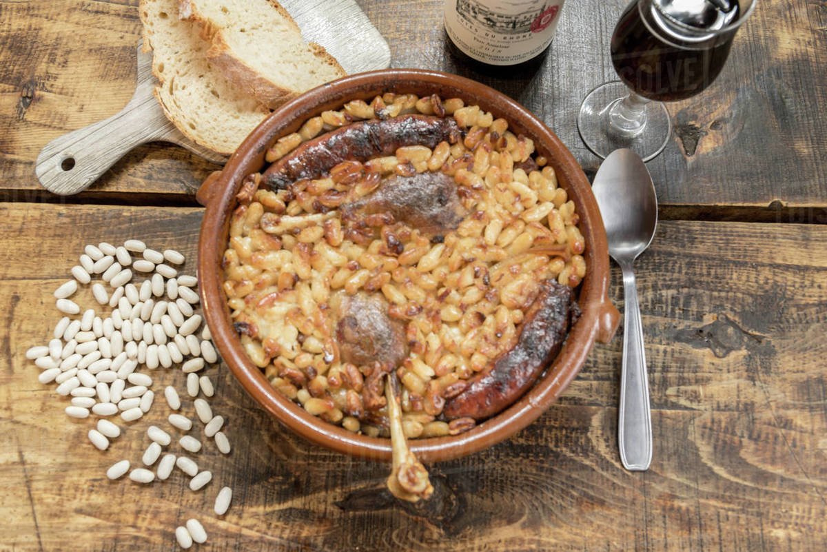 French specialty cassoulet, a meal with white beans, duck leg, sausage