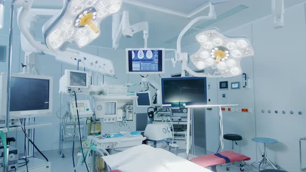 Establishing shot of technologically advanced operating room with no ...