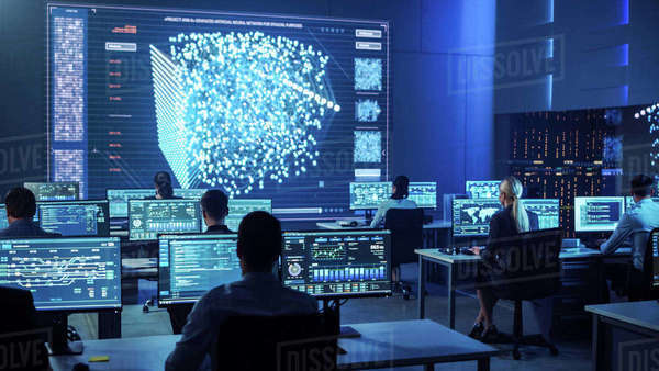 Team of Professional Computer Data Science Engineers Work on Desktops ...