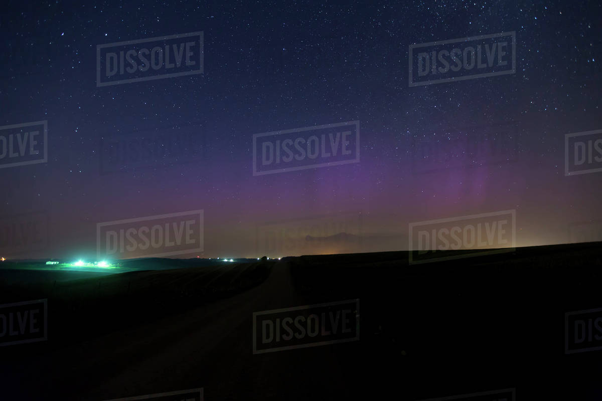 Aurora Borealis (Northern Lights) low on the horizon from Highway 3