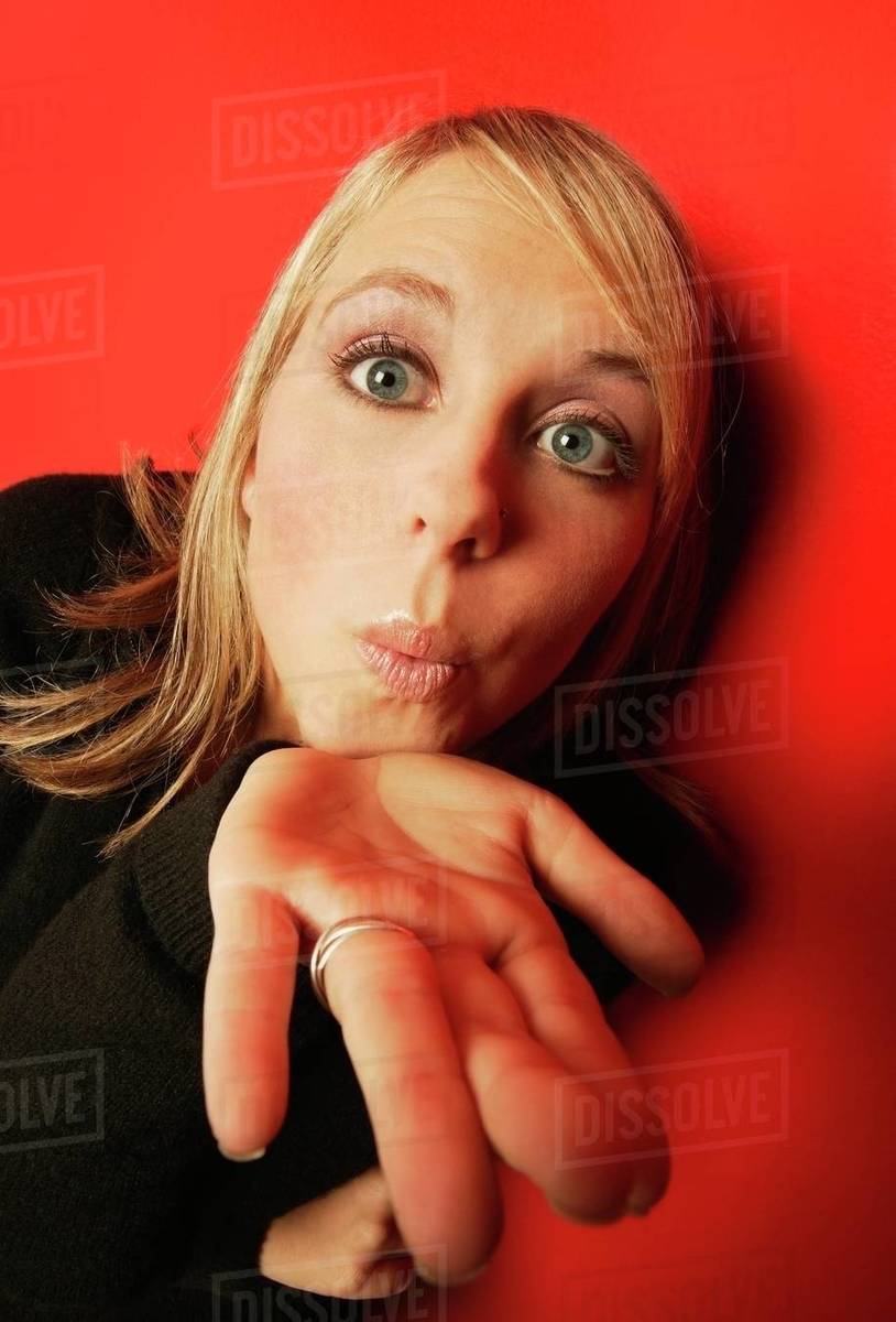 Woman Blows A Kiss Stock Photo Dissolve