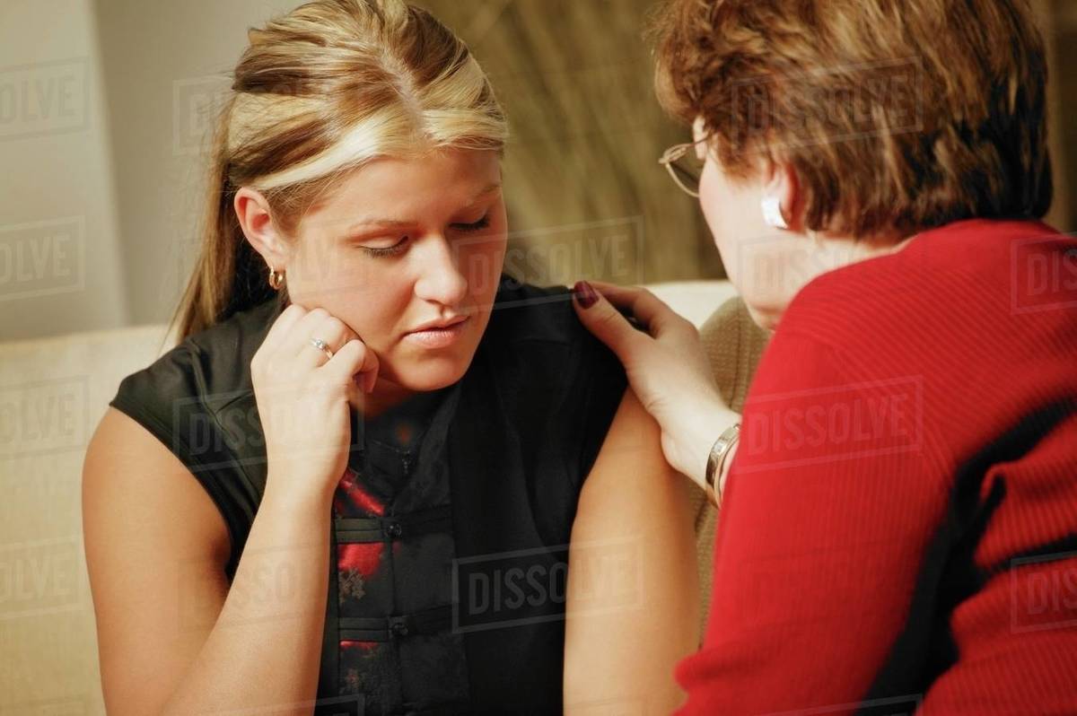 Women Praying Together Stock Photo Dissolve
