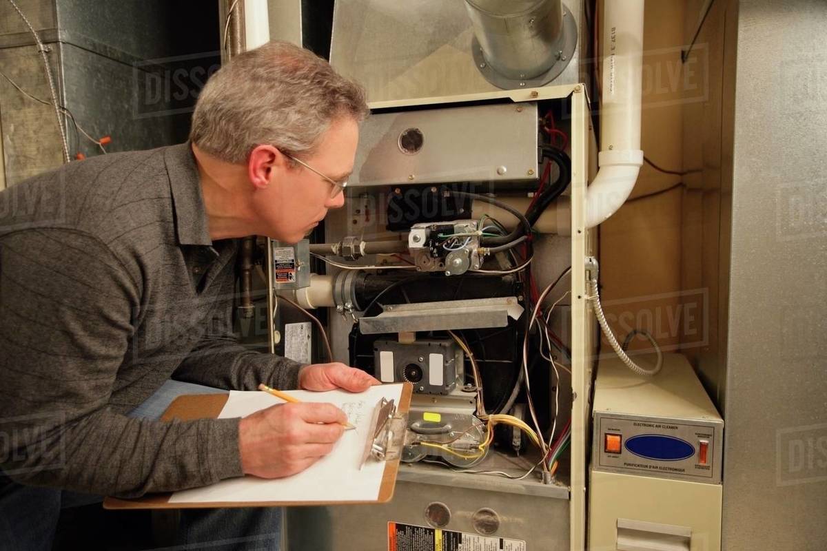 Furnace Repairman Stock Photo Dissolve