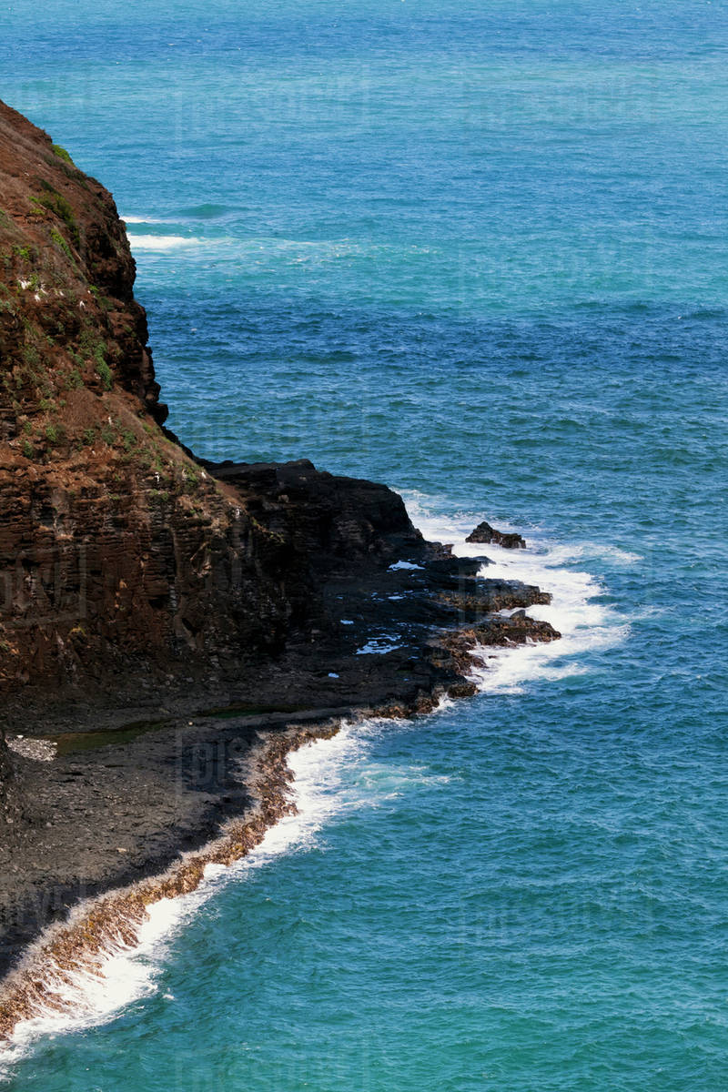 Surf along the Kilauea cliffs; Kilauea, Kauai, Hawaii, United States of