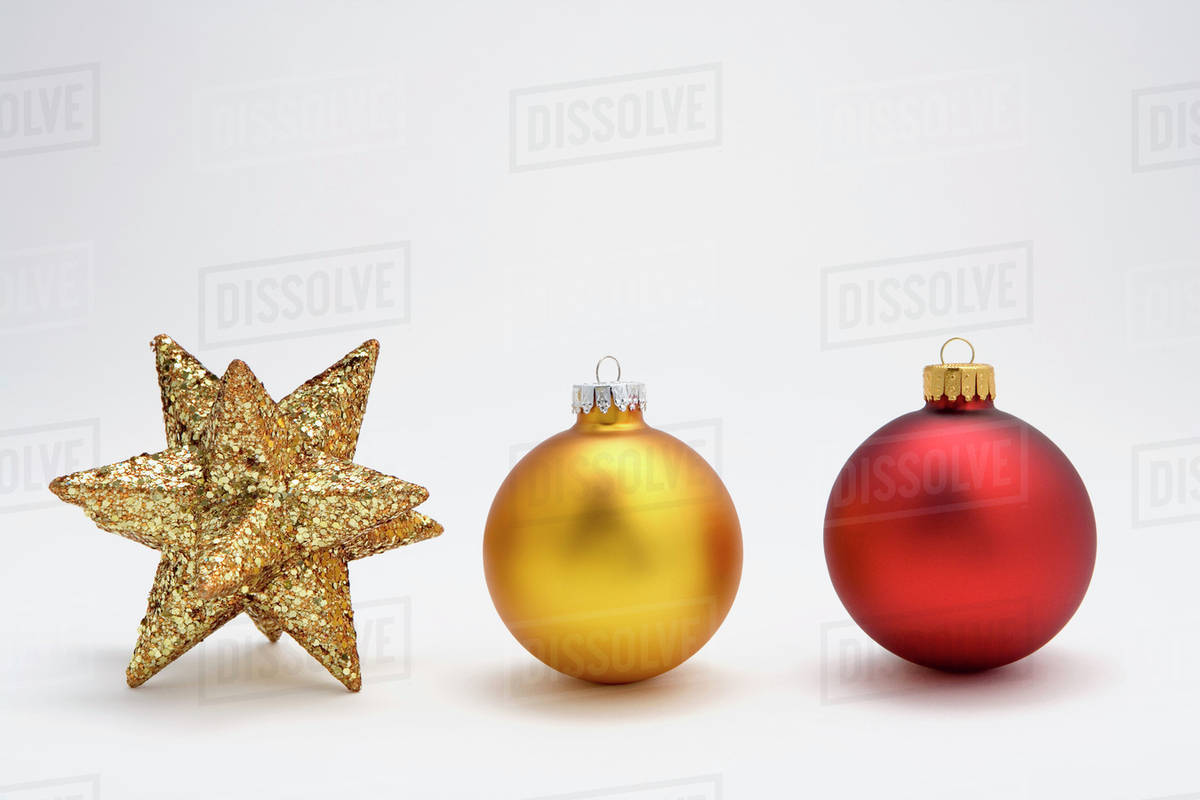 two christmas tree bulb ornaments in row with star ornament on white christmas tree bulbs ornaments