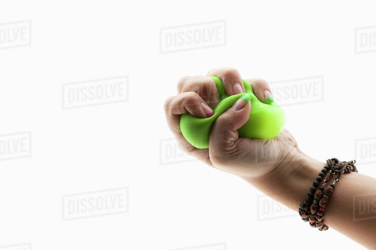 hand squeezing stress ball
