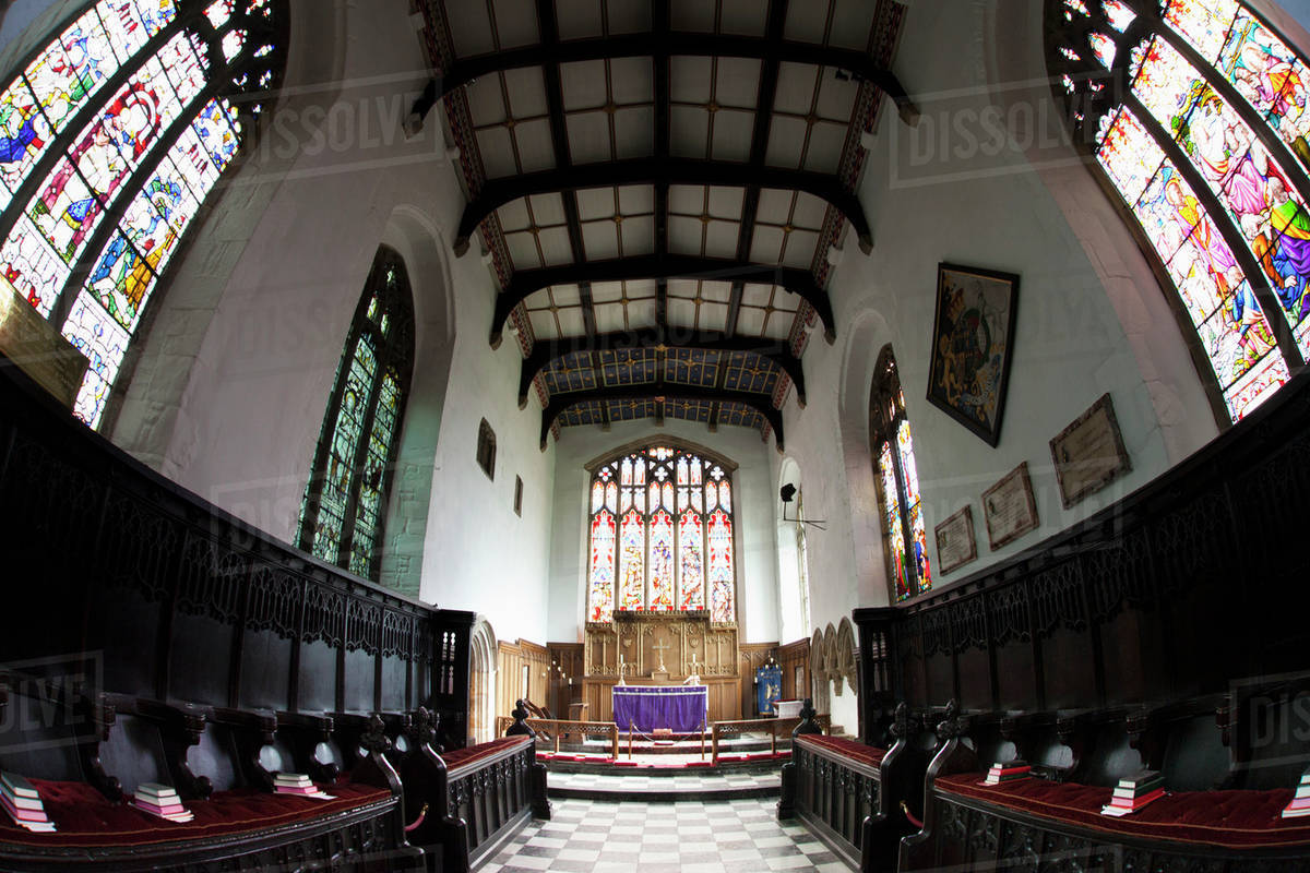 Centre Aisle In A Church With Stained Glass Windows; Staindrop, Durham