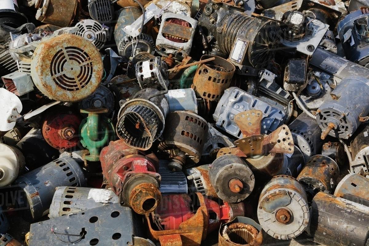 Quebec, Canada; Discarded Electric Motors At A Scrap Metal Recycling Junkyard Stock Photo Quebec, Canada; Discarded Electric Motors At A Scrap Metal Recycling Junkyard Stock Photo