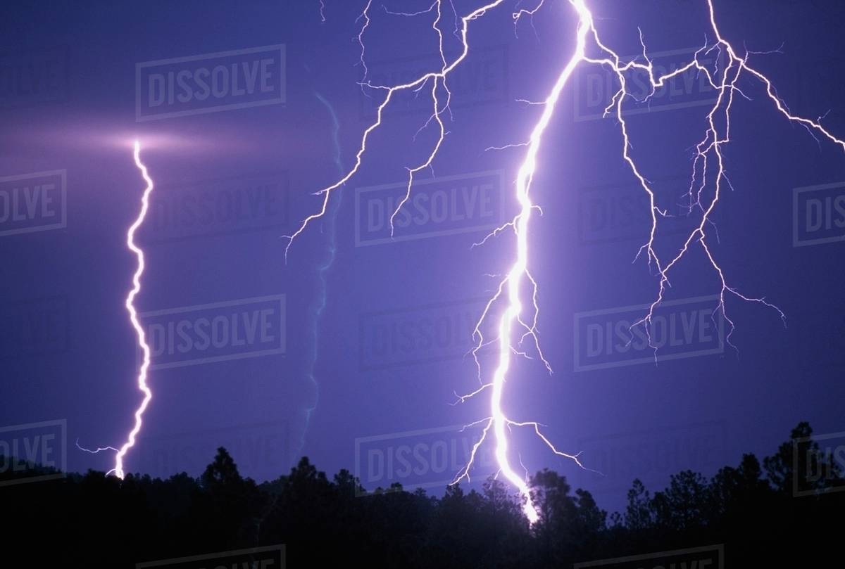 Lightning Bolts In Night Sky Stock Photo Dissolve