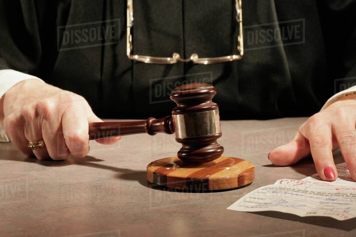 Judge Using A Gavel Stock Photo Dissolve