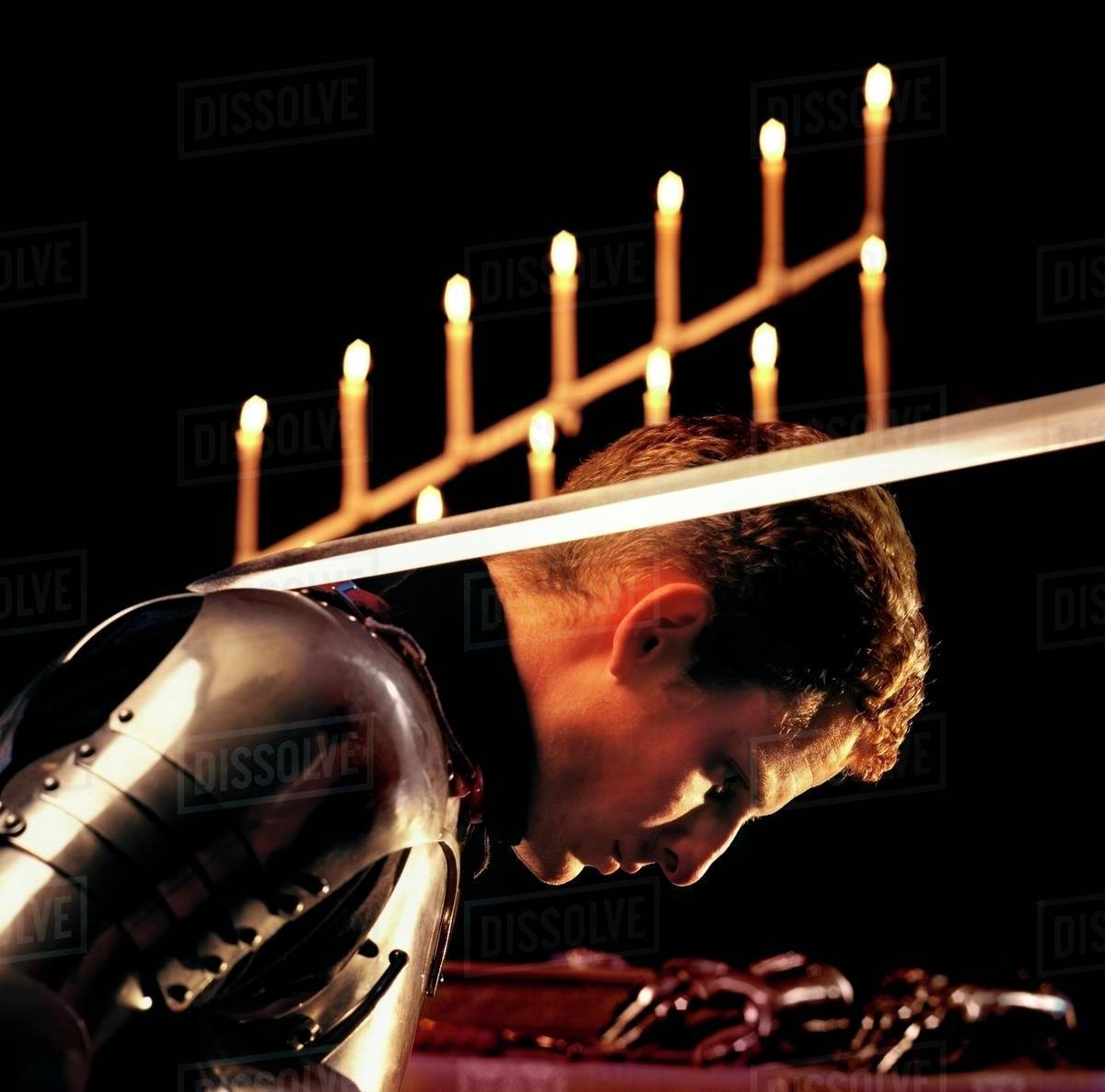 Man In Armor Being Knighted, Side View Stock Photo Dissolve