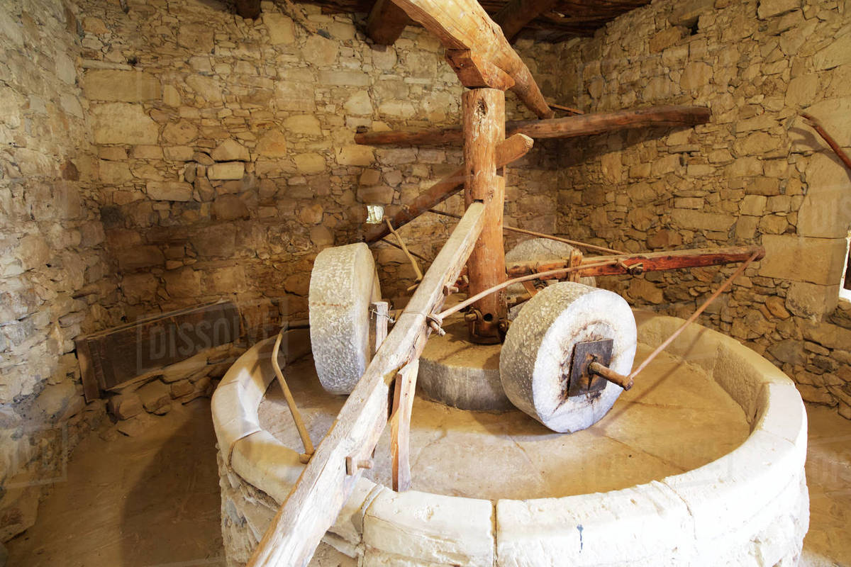 Traditional olive oil press on olive farm, Crete Stock Photo Dissolve