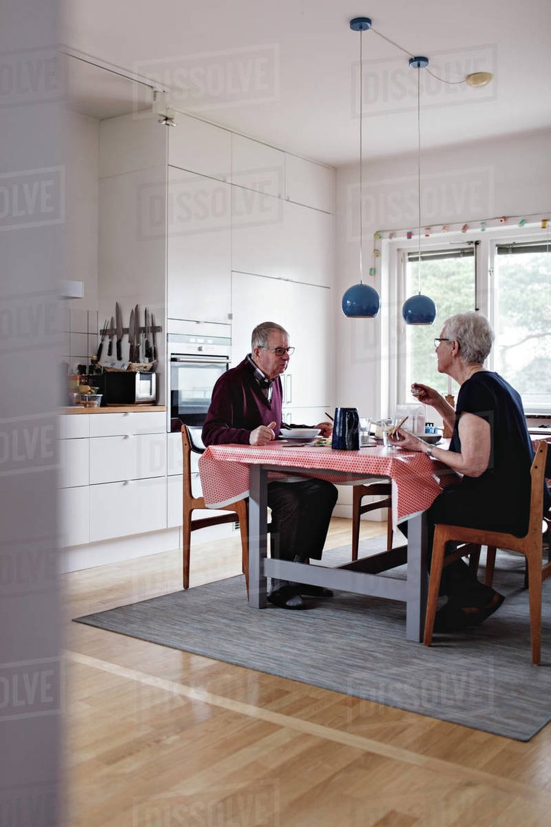 Full Length Of Senior Eating Food At Dining Table D929 48 604 Full Length Of Senior Eating Food At Dining Table D929 48 604